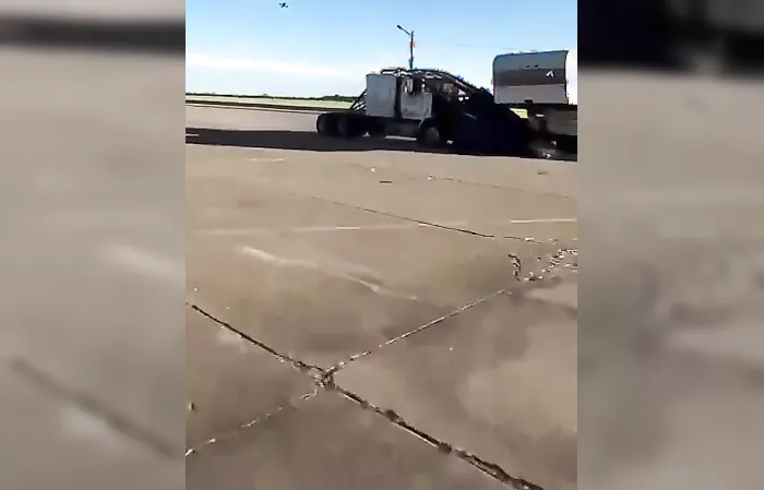Custom Semi truck destroys 16 cars, boat, RV and a bounce house