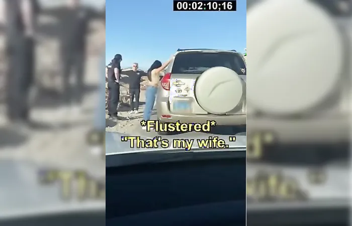 Cop finds his wife with another man during traffic stop