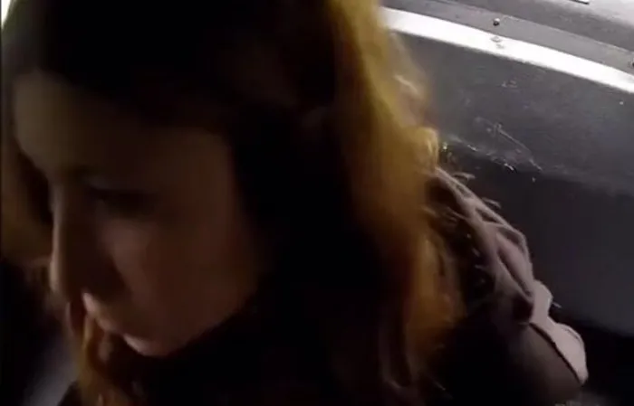 Girl slips out of handcuffs and drinks a White Claw in cop car