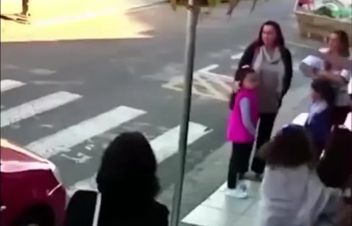 Woman takes out suspect in the streets