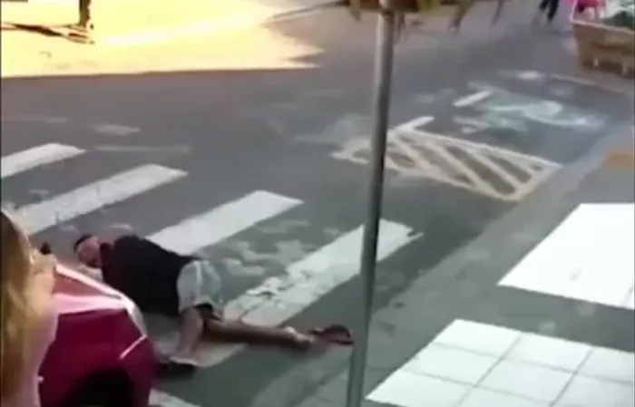 Woman takes out suspect in the streets