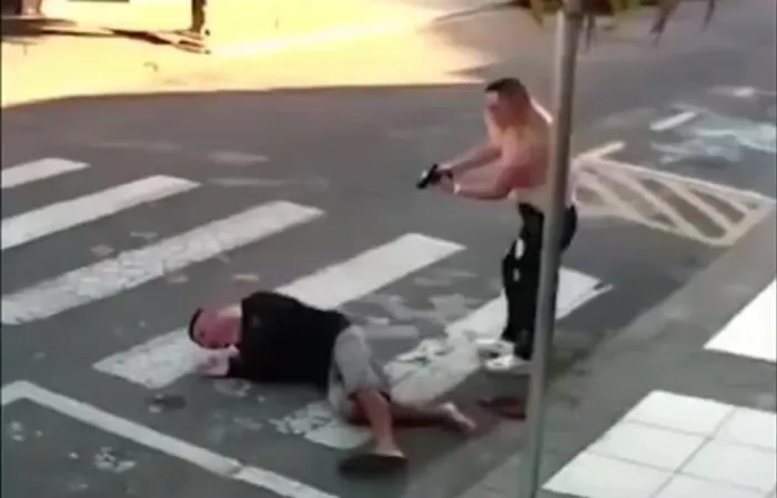 Woman takes out suspect in the streets