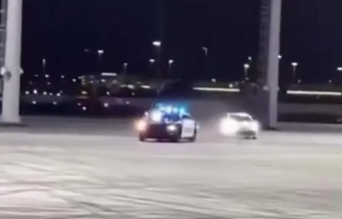 Cop pulls off epic Matrix/John Wick style move from a moving car