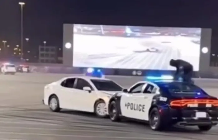 Cop pulls off epic Matrix/John Wick style move from a moving car