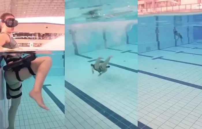 Swimmer shows gear for underwater propulsion