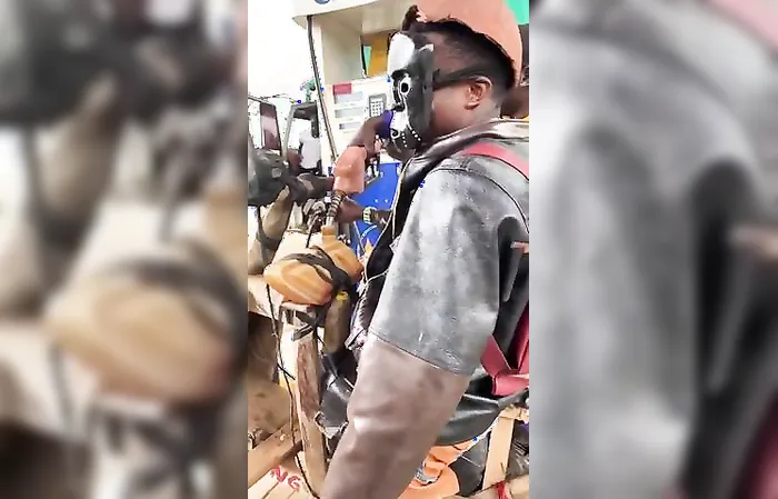 Dude drives a homemade motorcycle