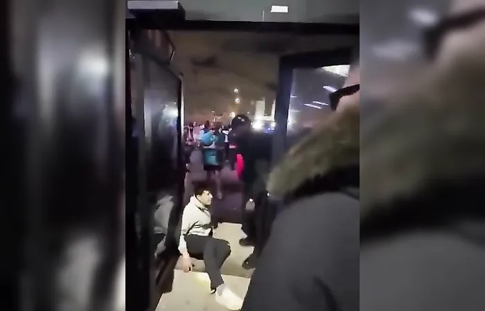 Bouncer pushes dude THROUGHT the door