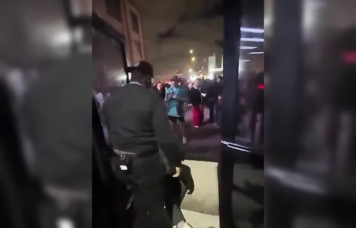Bouncer pushes dude THROUGHT the door