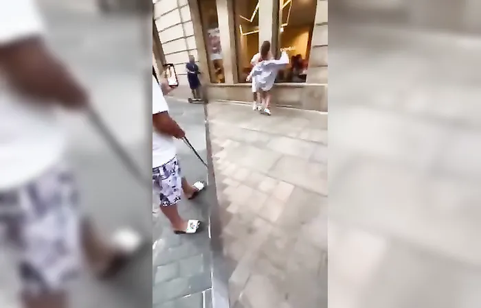 Weirdo woman in Spain stalks a random stranger