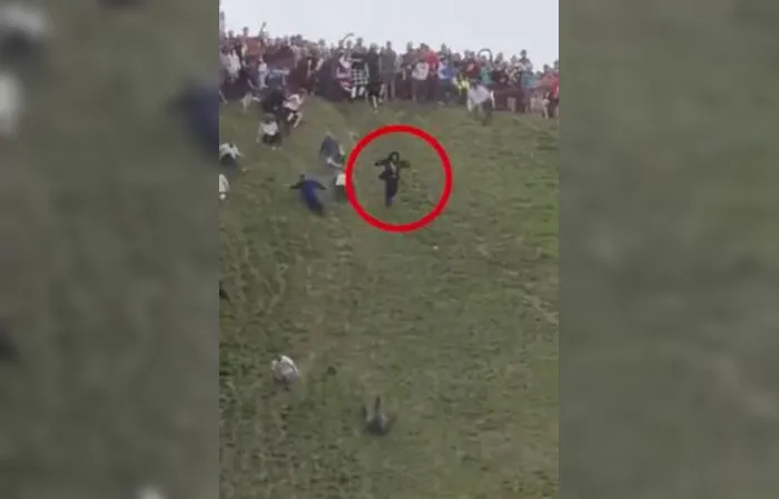 Man goes AIRBORN chasing a cheeseball down steep 200-yard hill