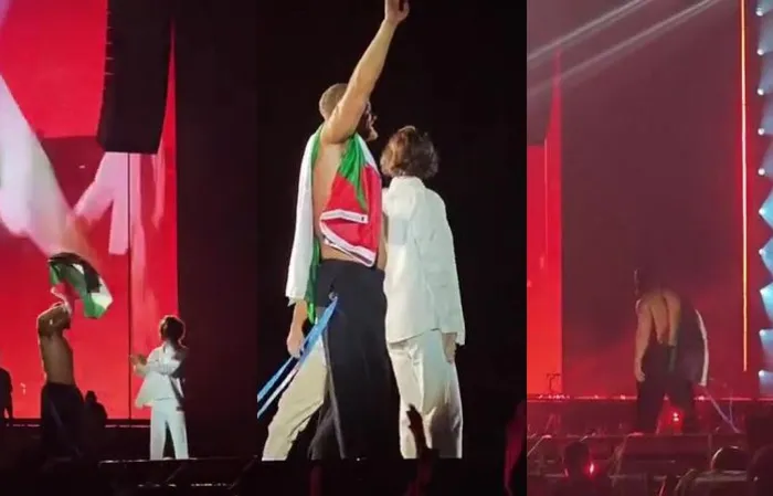 Imagine Dragons ends by waving Palestinian flag