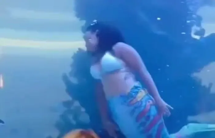 Mermaid nearly drowns, rips off her suit