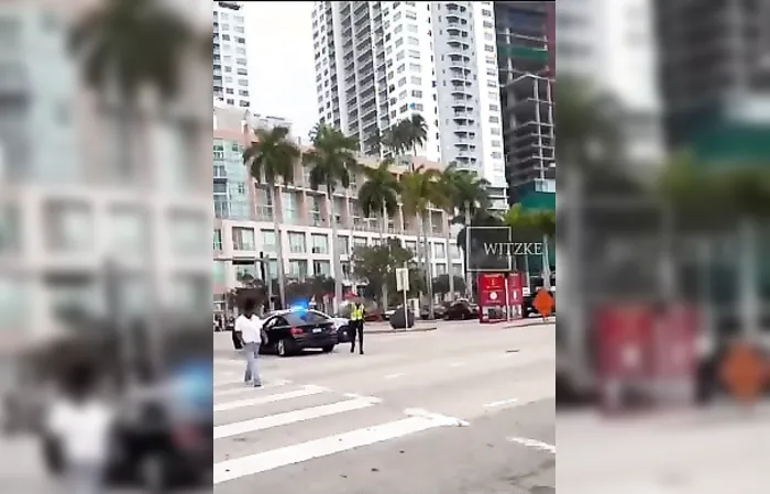 Driver hits cop, who then fires gun through windshield