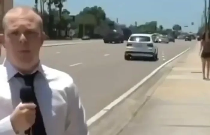 Woman steals reporter's mic to say something hilarious, but very profane