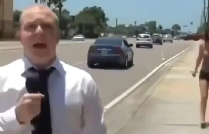 Woman steals reporter's mic to say something hilarious, but very profane