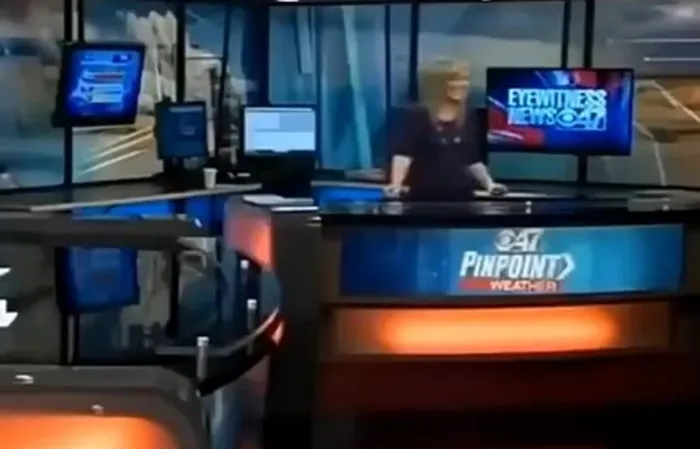 Woman steals reporter's mic to say something hilarious, but very profane