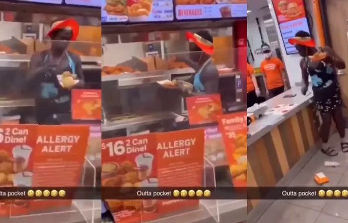 Woman climbs over counter for free chicken