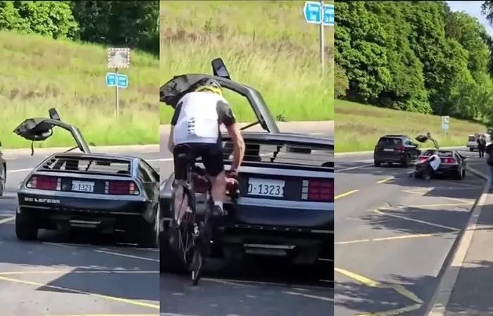 Cyclist crashes FACE FIRST into DeLorean