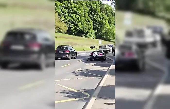 Cyclist crashes FACE FIRST into DeLorean