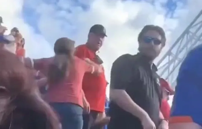 Guy picks up girlfriend by the pants to stop a fight