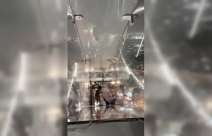 Lady has epic fail going down slide, dude doesn't care