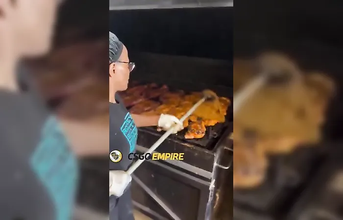 Woman MOPS the food on her grill