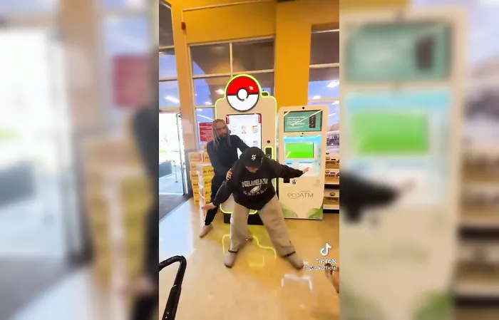 Two grown men fight over Pokémon cards