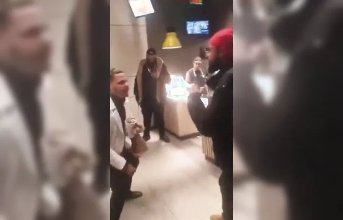 Guy holding Happy Meal defeats opponent in one-sided fight