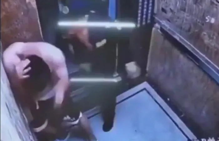 Doorman saves woman from guy beating her up