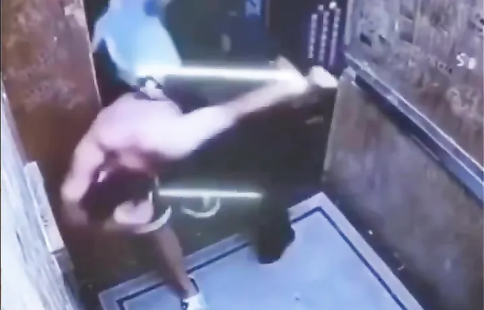 Doorman saves woman from guy beating her up