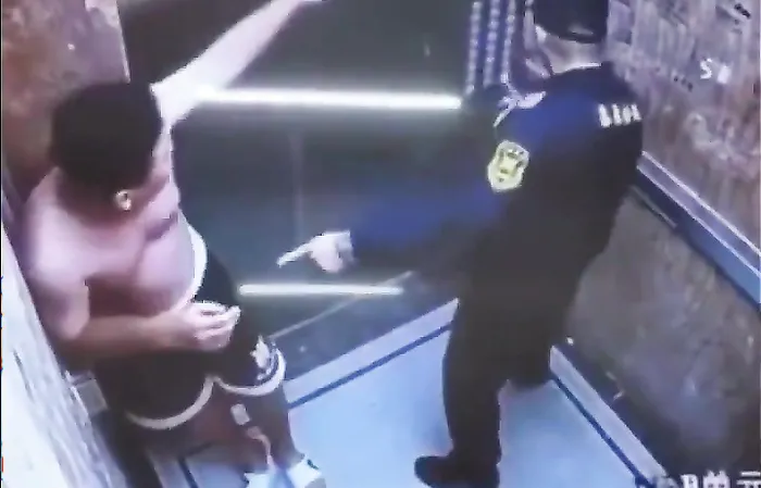 Doorman saves woman from guy beating her up