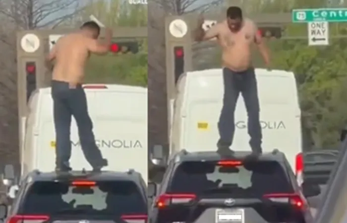Man jumps on stranger's car in traffic