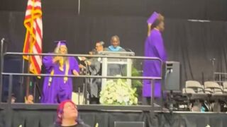 Girl gets KICKED in head during graduation backflip