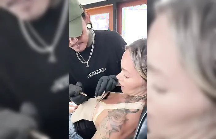 Woman has tan lines tattooed