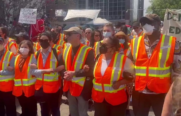 Protesters form Wall of Orange at Columbia University