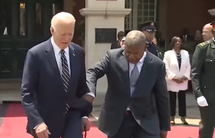 Biden nearly trips, then stares into the distance before a handshake in Africa